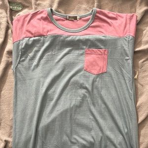 Brand new shirt a blue and pinkish color